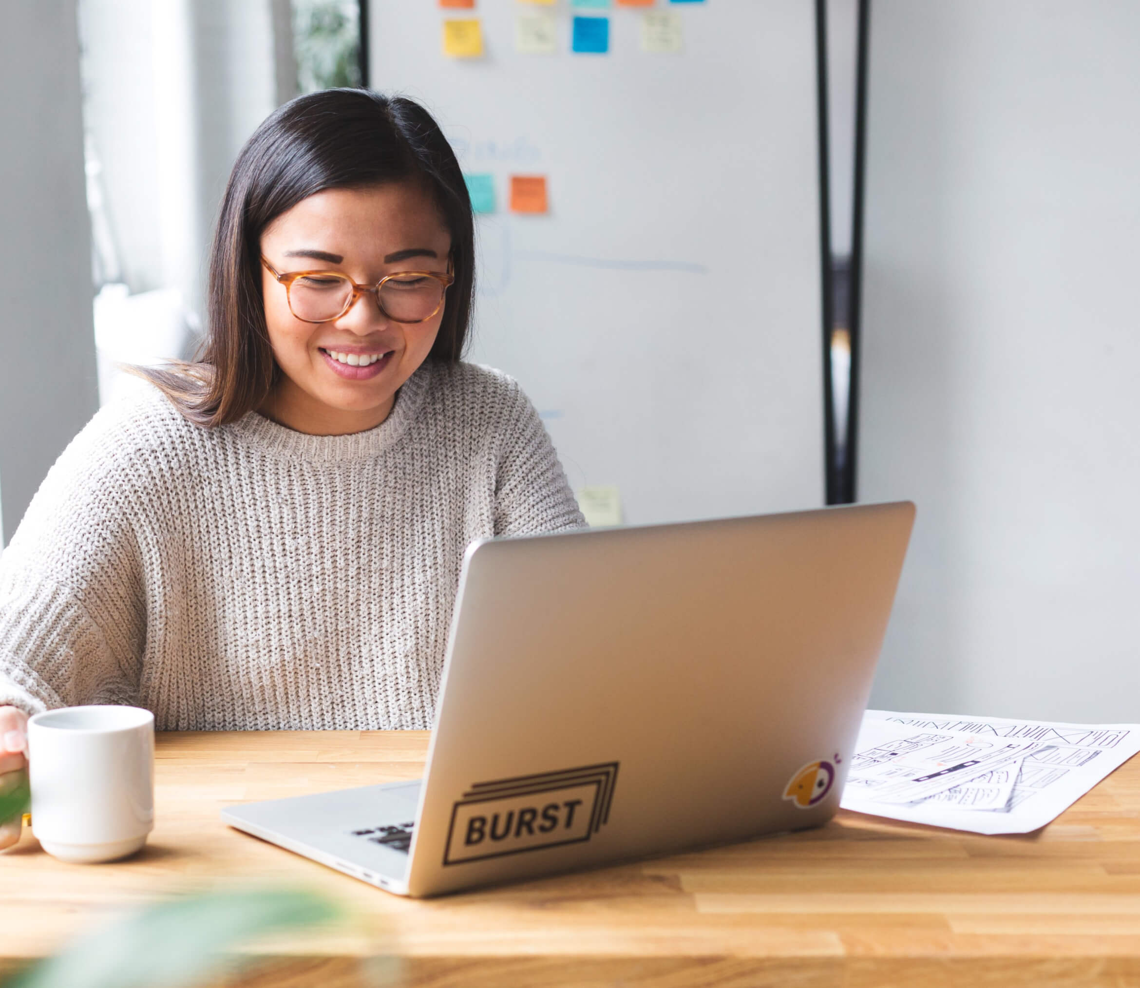 female sitting and using computer